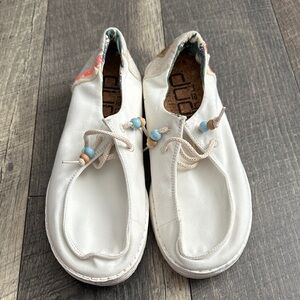 Woman’s White Canvas Slip-On Shoes with Bead Accent